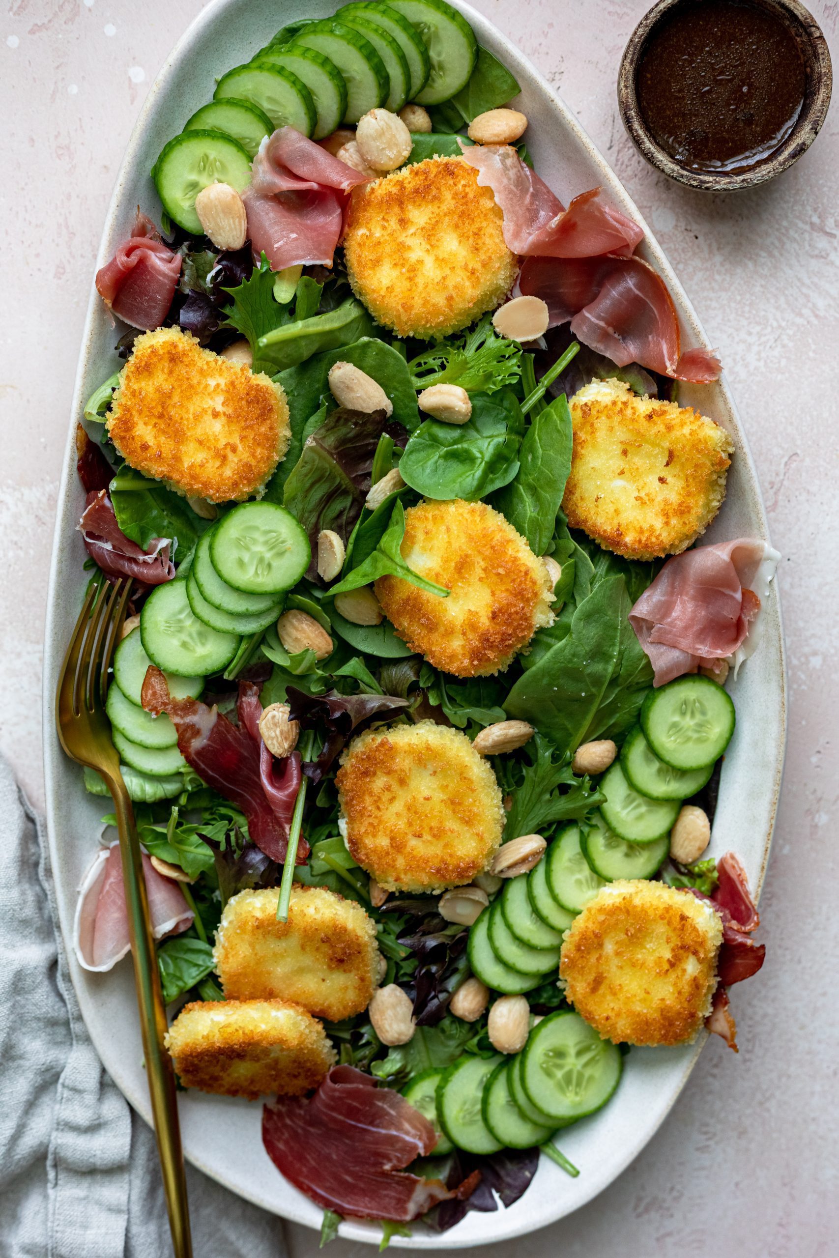 Fried goat cheese salad with prosciutto 